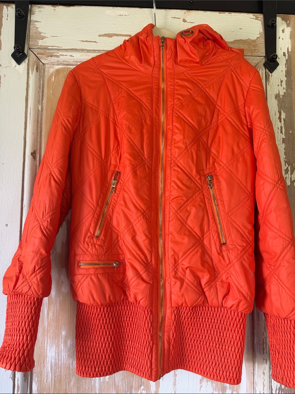 Women's Quilted Hooded Bomber Jacket in Vibrant Orange